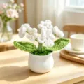 Detailed macro view of handmade white crochet flowers in a ceramic pot. - 5-Head Gypsophila / White
