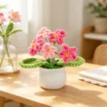 Elegant handmade pink and red crocheted flower potted plant ornament in a white pot - 5-Head Forget-me-not Potted Plant / Rose Red Gradient