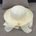 Elegant wide-brimmed white straw sun hat featuring a charming yellow polka-dot mesh bow detail - M (56-58cm) / Hemp bow ribbon milk White
