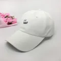 Classic white baseball cap with stylish black embroidered letter front design, casual sun hat. - Adult Adjustable 55-59cm / Smiley White
