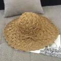Hand-woven wide brim straw sun hat for women in natural khaki finish with decorative bow - M (56-58cm) / Hand Crochet Wave Khaki