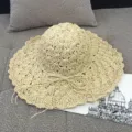 Elegant wide-brim beige straw sun hat for women with woven bow detail. - M (56-58cm) / Hand Crochet Wave Beige