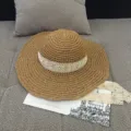 Elegant women's wide brim straw sun hat featuring a delicate white lace ribbon tie - M (56-58cm) / Lace lace khaki