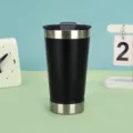 Stainless steel vacuum insulated tumbler detail view, black matte finish, 20oz capacity. - 20oz / Black