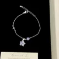 Elegant silver-tone chain bracelet with sparkling purple micro-pave zircon star charms - Purple Star Bracelet (R2105)