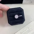 Detail view of a silver ear bone clip with a sparkling pink rose-cut stone setting - 1 Piece / Pink Rose Cut (R0414)