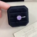 Close-up of purple rose cut stone on silver ear cuff inside a black velvet box. - 1 Piece / Purple Rose Cut (R0554)