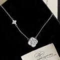 Elegant silver four-leaf clover pendant necklace with sparkling cubic zirconia stones - White Zirconia Four Leaf Flower Necklace (R5676)