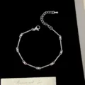 Bracelet élégant en argent avec des accents de zircon rose et un style français doux - Style Bambou (R5819) / Rose