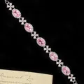 Elegante pulsera estilo francés con gemas ovaladas rosas y eslabones de flores plata. - Estilo de Trébol de Cuatro Hojas (R1992) / Rosa