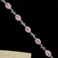 Pulsera de plata de estilo francés con gemas rosas ovales y delicados lazos dulces - Estilo de Lazo (R0313) / Rosa