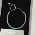 Bracelet bolo ajustable avec zircons bleu clair et chaîne en argent élégante - Style Coulissant Réglable (R2259) / Bleu Transparent Glacé