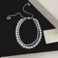 Élégant bracelet double couche ajustable avec zircons bleus et perles de lavande - Style Superposé à Double Couche (R0370) / Bleu