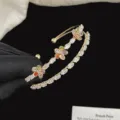 Elegante bracciale a tre strati con fiori dorati e pietre lucenti taglio marquise - Bracciale Fiorellino Oro (R0037) / Oro