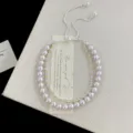 Dettaglio di bracciale a doppio strato in stile francese con perle e zirconi gialli - Braccialetto a Doppio Strato Manta (R0567) / Giallo