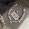Elegant pearl bracelet featuring purple crystal beads and a pink rhinestone cat pendant - Kitten Style (R2644) / Purple