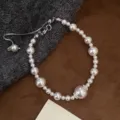 Elegant multi-size white pearl bracelet with adjustable silver chain and rhinestone detail - Manta Classic Style (R2321) / White