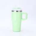 Detailed side view of a 20oz light green stainless steel tumbler with handle and straw - 20oz / Light Green