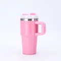 Side view of 20oz pink stainless steel insulated tumbler with straw and handle - 20oz / Pink