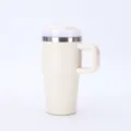 Detailed view of cream 20oz stainless steel travel tumbler with handle and straw - 20oz / Milky White