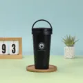 Black stainless steel insulated travel coffee mug with portable handle for outdoor office use - 500ml / Black