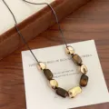 Exquisite natural tiger eye stone beaded necklace with gold accents in Maillard style - Black Snake Chain Tiger's Eye Necklace (R5175)