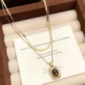 Maillard style double layer gold necklace featuring a natural tiger eye stone pendant - Double Layer Rectangular Tiger's Eye Necklace (R0179)