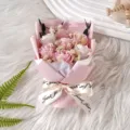 Detail view of pink rose soap flower bouquet with dried baby's breath and ribbon. - 7 Pink & White Flowers with Dried Flowers