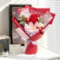 Detailed view of handmade crochet rose and tulip bouquet in elegant red wrapping - Red (With Black Gift Box)