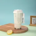 Détail du tasse à café isotherme en acier inoxydable avec motif de lys et sangle. - 500ml / Blanc (Muguet)