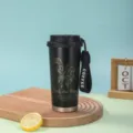 Tasse de voyage isotherme en acier inoxydable noir avec motif de lys et sangle portable - 500ml / Noir (Muguet)