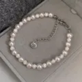 Elegante bracciale con perle rosa chiaro e micro-pavé di zirconi per donne gioielli - Stile Rosa R0343