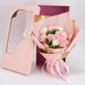 Detail shot of pink soap flower bouquet with gift box, romantic gift for Valentine's Day. - Grid Austin Pearl Bouquet + Feather Gift Box / Pink