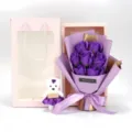 Detailed view of 7 purple soap roses gift set including a cute bear and pink gift bag - Deep purple