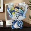 Elegant blue soap rose bouquet with a cute teddy bear for Valentine's Day gifting - Bouquet + Gift Box (Without Bag) / Grey Gift Box - Hydrangea & Manta - Blue Flower - Bear
