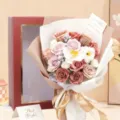 Elegant artificial soap flower bouquet featuring 18 manta roses in a premium red gift box - With Handbag (18pcs Window Gift Box) / Coffee