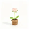 Close-up detail of a handmade crochet potted flower, exquisite pink bloom and green leaves. - Small Potted Rose Champagne Pink