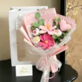 Hand-knitted crochet flower bouquet with pink lily and heart in elegant gift packaging - Cosmos Tulip Rose Heart Gift Bag / Pink