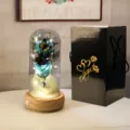 Rose éternelle bleue lumineuse sous dôme de verre avec boîte cadeau noire élégante - Boîte Noire en Carton Ondulé (Base Bois + 2 Fleurs de Savon + Boîte Musique) / Bleu