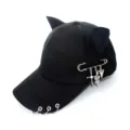 Black baseball cap detail showing punk style metal rings and chain pin accessories. - Adult 55-58cm / Safety Pin Snake Black