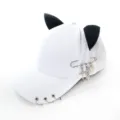 White baseball cap featuring black cat ears, metal rings, and gothic safety pin charms. - Adult 55-58cm / Safety Pin Snake White