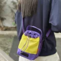 Borsa a secchiello sportiva con coulisse viola e gialla per attività all'aperto - Viola E Giallo