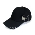 Black baseball cap with metal rings and butterfly chain charm, punk style hat detail view. - Black Butterfly Pin