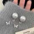 Detailed view of exquisite butterfly pearl earrings with natural shell and zircon inlay - Mother Of Pearl Butterfly Artificial Pearl Earrings (R5686)