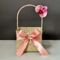 Close-up detail of handcrafted seagrass woven gift basket with elegant pink ribbon bow. - Large Size (18*18*13) / Pink Moth Orchid Style