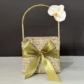 Close-up detail of a handmade woven seagrass gift basket decorated with a green ribbon bow. - Large Size (18*18*13) / White Phalaenopsis Style
