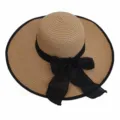 Detailed top view of a summer straw sun hat featuring a large brim and elegant black bow - Adult 55-58cm / Khaki Hat with Black Edge