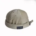 Beige vintage corduroy skullcap docker hat showing fabric texture and patch detail - Adult 55-58cm / Beige
