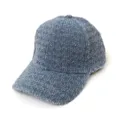 Close-up detail of textured blue fabric baseball cap, showing curved brim and stitching. - Adult 55-58cm / 6 Light Blue