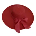 Close-up of a red woven straw sun hat with a wide brim and decorative bow - Adult 55-58cm / Watermelon red